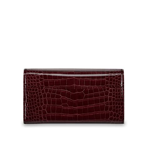 Capucines Long Wallet Crocodilien Brillant .